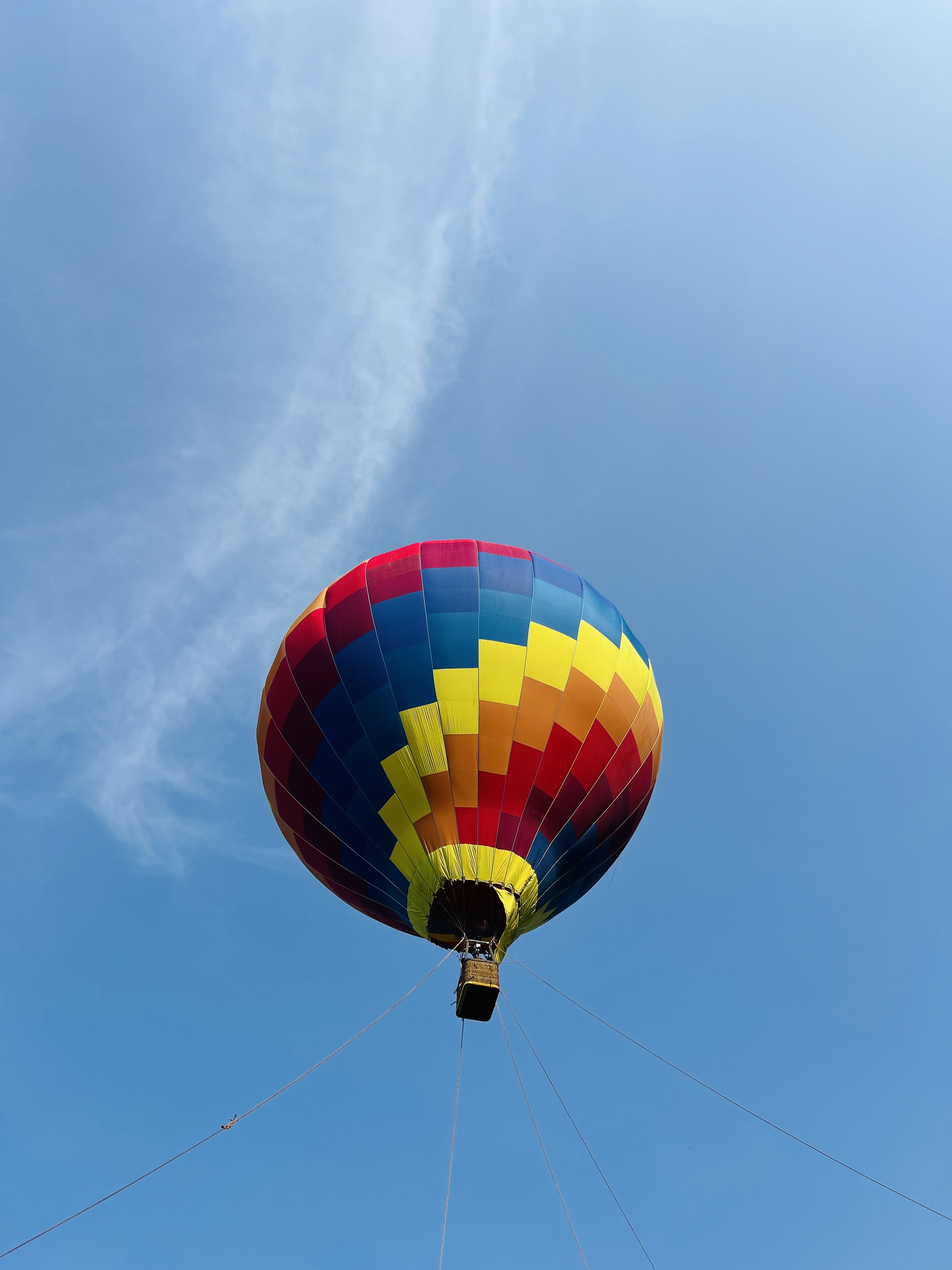 Hot air balloon over misty mountains
